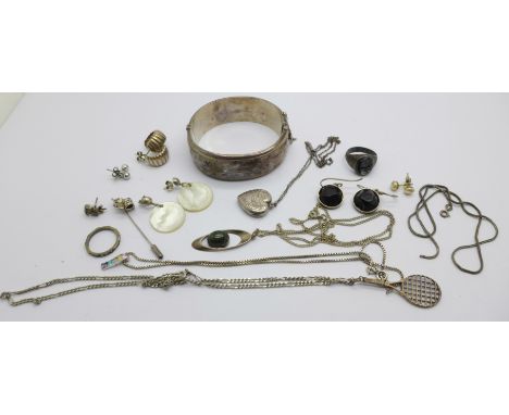 Silver jewellery including a bangle, pendants, a ring, etc. 