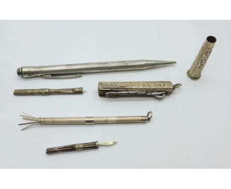A silver swizzle stick, a silver Life-Long pencil, etc., (two tooth picks a/f) 