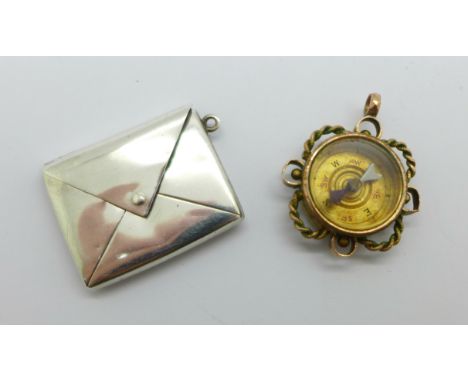 A 9ct gold compass fob, Chester hallmark and a silver stamp case, Birmingham 1902 