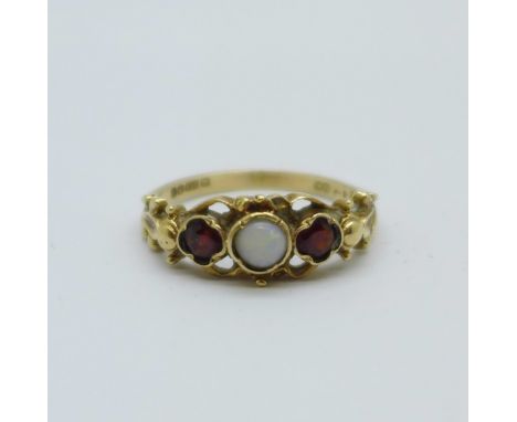 A 9ct gold, opal and garnet ring, 2.3g, O 