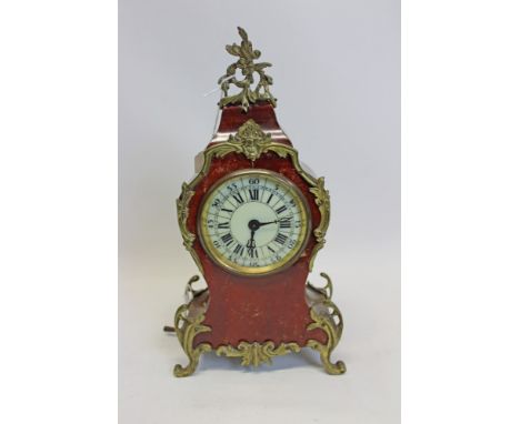 20th century mantel clock with timepiece movement and cylinder escapement, white enamel dial with Roman numerals and outer mi