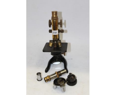 Early 20th Century Ernst Leitz Wetzler lacquered brass microscope No. 232676, 33cm high, with various additional optical lens