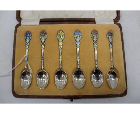 Set of six 1920s silver and enamel teaspoons with enamelled flower-head terminals, in a fitted case (Birmingham 1928)