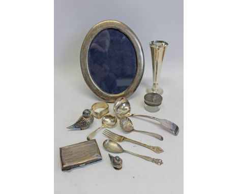 Contemporary oval silver photograph frame (Sheffield 1987), George III silver fiddle pattern caddy spoon (London 1907) and a 