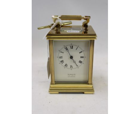 Contemporary carriage clock with eight day, eleven jewel Swiss movement with lever escapement, striking on a gong, back plate