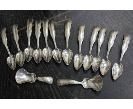 Set of twelve 19th century Dutch silver teaspoons with engraved handles, together with two matching caddy spoons