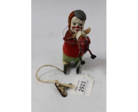 Schuco - clockwork model of a clown and a somersaulting mouse, with key