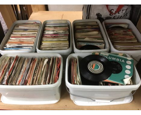 Six boxes of 7 inch singles by various artists including The Rolling Stones, T Rex, The Shadows and many more.