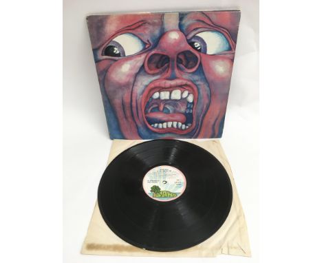 An early UK pressing of 'In The Court Of The Crimson King' by King Crimson. Light hairline scratches to track 1, side 1 and p
