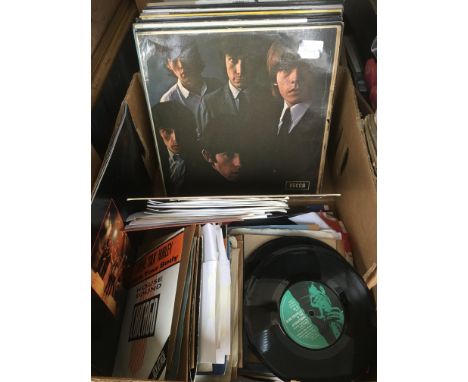 A collection of LPs, 7 inch singles and 78s by various artists including The Rolling Stones, Stevie Wonder,