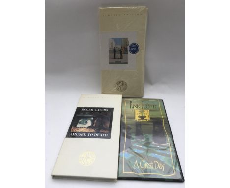 A limited edition Pink Floyd 'Wish You Were Here' master sound CD long box together with another Pink Floyd CD set and a limi