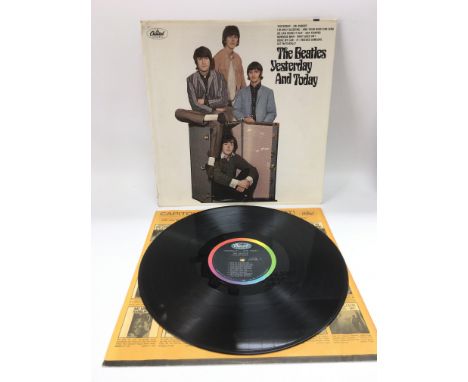 A second state 'Yesterday And Today' LP by The Beatles, T2553 with pasted over 'trunk cover'. The original 'butcher sleeve' i