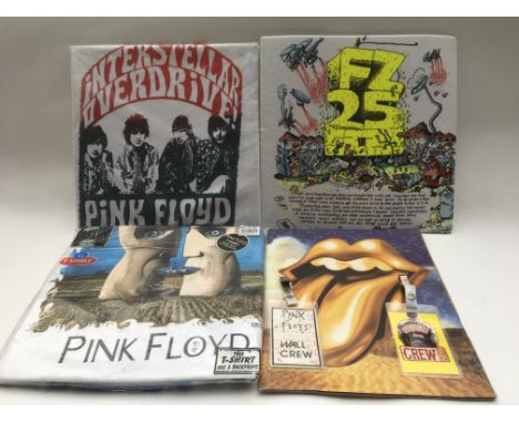 Two Pink Floyd t-shirts, a Rolling Stones tour program, tour laminates etc.