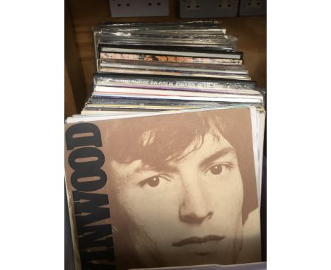 A collection of LPs by various artists including The Rolling Stones, The Beatles, Ry Cooder, Steve Winwood and many more.