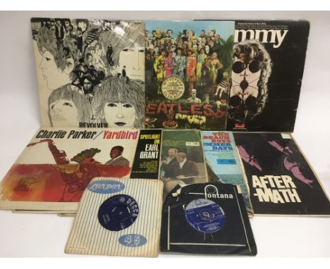 A collection of rock, pop and jazz LPs by various artists including The Beatles, Rolling Stones and. Charlie Parker plus two 