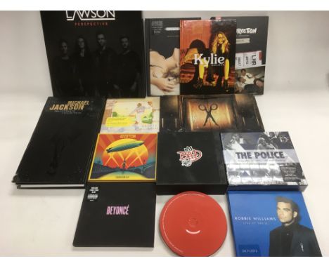 A collection of CD box sets by various artists including Led Zeppelin, Michael Jackson, The Police, Beyonce and others.