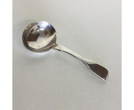 A Georgian silver fiddle pattern caddy scoop. London. By BD. Approx. 14 grams. Est. £30 - £50.