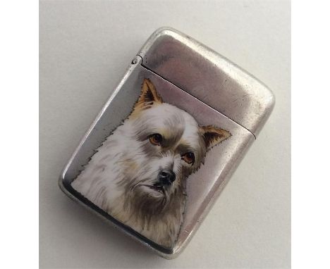 A novelty silver and enamel vesta case depicting a white dog. Birmingham. By LE. Approx. £150 - £200.