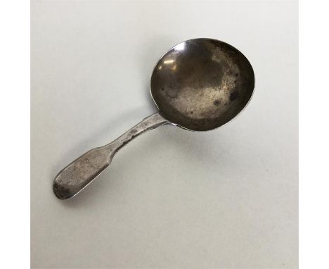 A Georgian silver caddy spoon. London. By CB. Approx. 12 grams. Est. £30 - £50.