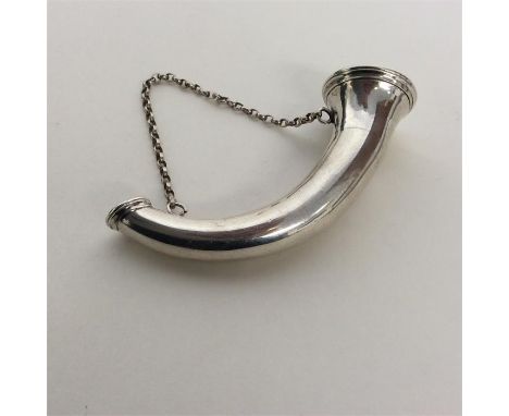 A silver novelty snuff box in the form of a hunting horn with pierced grill on suspension chain. (Apparently unmarked). Est. 