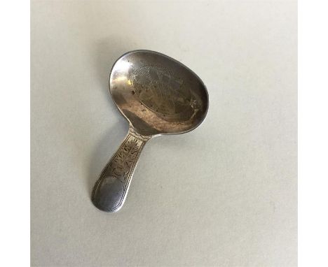 A good Georgian-style silver bright cut caddy spoon with floral decoration. Sheffield. By WBS. Approx. 11 grams. Est. £30 - £