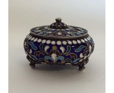 A Russian silver and enamel pot and cover on ball feet. Approx. 4 cms in diameter. Approx. 43 grams. Est. £40 - £60.