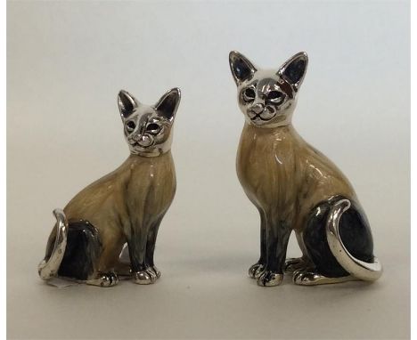 A good pair of Italian enamel and silver ornaments in the form of Siamese cats in seated positions. 925 Standard. Approx. 36 