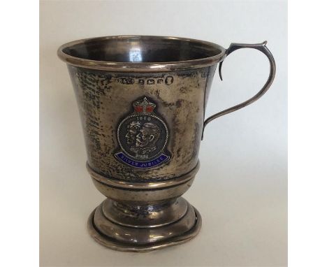 A small silver and enamel christening cup. Birmingham. By B&Co. Approx. 51 grams. Est. £15 - £20.