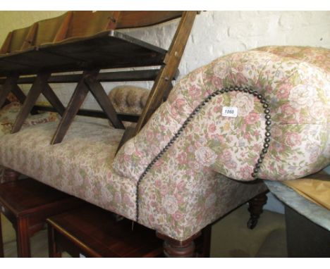 19th Century chaise longue having floral button back upholstery, raised on turned tapering supports with brass and ceramic ca