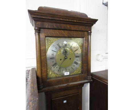 18th Century oak longcase clock, the square hood with caddy top above a rectangular door and a plinth base, the gilt brass an