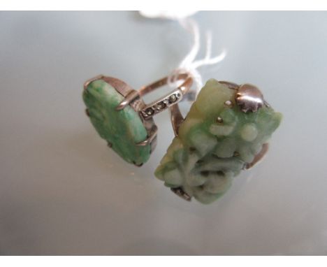 1920's Silver and carved jade ring together with a 9ct gold jade ring