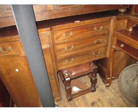 20th Century mahogany serpentine fronted twin pedestal sideboard having an arrangement of five drawers with two cupboard door