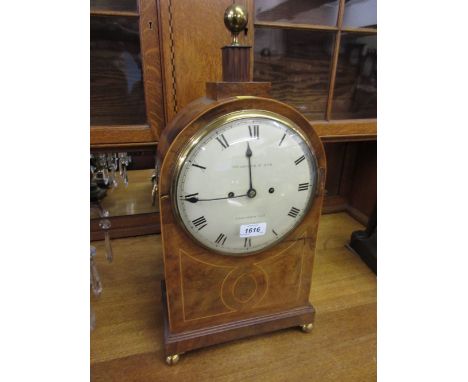 Regency mahogany and boxwood line inlaid bracket clock, the circular painted dial with Roman numerals, signed Woodcock & Son,