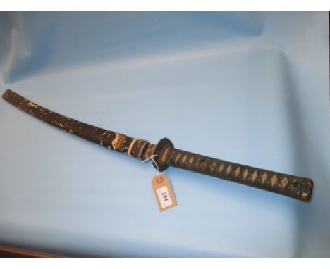 Japanese Samurai sword with bound shagreen grip and lacquered scabbard (restored), the 26in blade signed beneath the grip