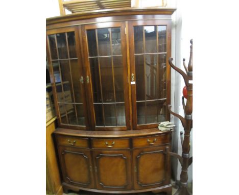 Reproduction mahogany circular pedestal dining table together with a set of six ladder back chairs and a bow fronted side cab