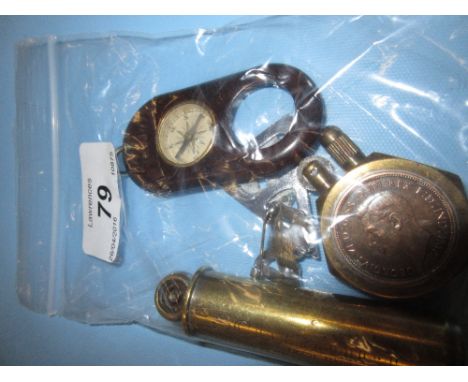 Small brass cased cigarette lighter incorporating a 1945 ha'penny, a Bakelite cased compass / key ring, a Schrader brass ball