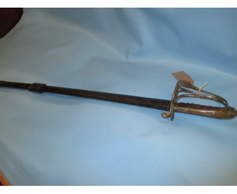 19th Century sword having brass, silvered and pierced guard, (grip a/f), the single fullered straight blade with leather scab