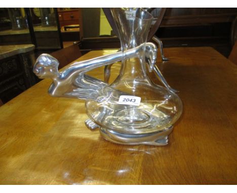Carrol Boyes, late 20th Century aluminium figural decanter stand