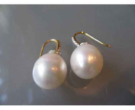 Pair of 18ct yellow gold large cultured pearl and diamond set drop earrings