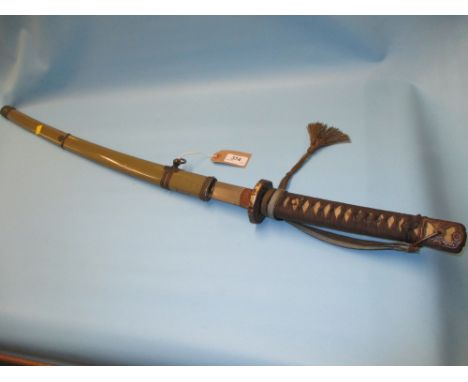 Japanese World War II military katana having metal scabbard, pierced and gilded tsuba with fabric bound sharkskin covered gri