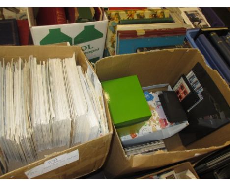 Two boxes of G.B. First Day covers, loose and a large number of unsorted used G.B. stamps, presentation packs and mint part s