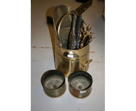 Pair of World War I Trench Art shell case bases engraved with flowers together with a brass coal bucket and fire tools