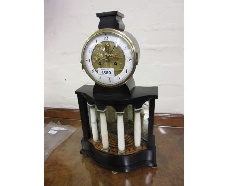 19th Century Continental ebonised automaton clock with alabaster pillars, the enamel and gilt brass dial with Arabic numerals