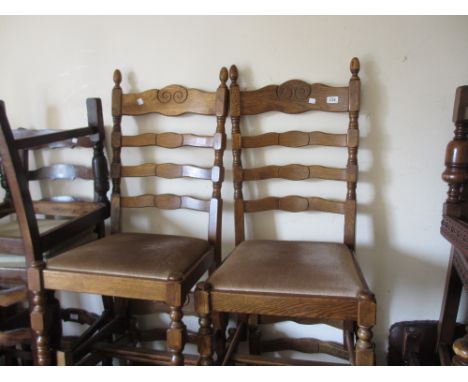 Reproduction oak dining room suite comprising: set of six ladder back chairs, an extending dining table, a dresser and a corn