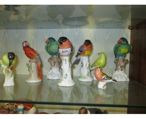 Four 20th Century Meissen figures of birds together with four other similar by K.P.M., Sitzendorf and Dresden