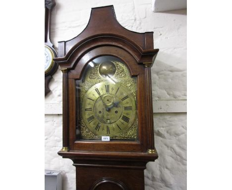 18th Century oak longcase clock, the pagoda hood enclosing a brass dial with pierced spandrels, the chapter ring having Roman