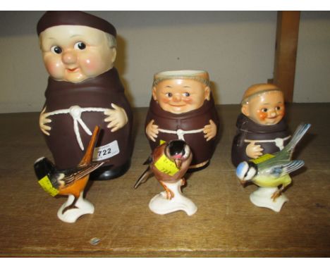 Three Goebel figures of birds, three Goebel Happy Monk figures including a large water pitcher