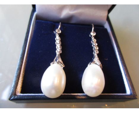 Pair of 18ct white gold cultured pearl and old cut diamond set drop earrings