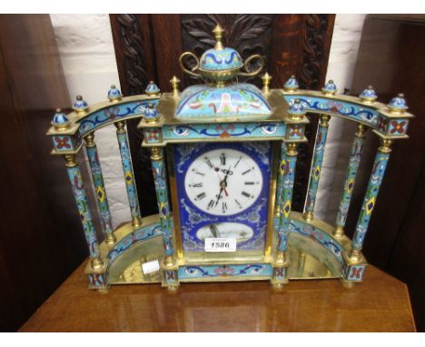 20th Century gilt brass and cloisonne mounted mantel clock with porcelain panels, the circular dial with Roman numerals havin