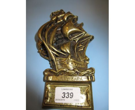 Large brass door knocker in the form of the Cutty Sark